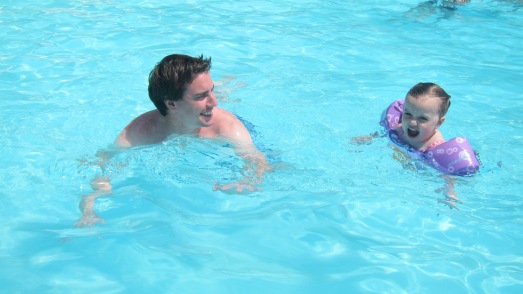 Elodie and Daddy, swimming around